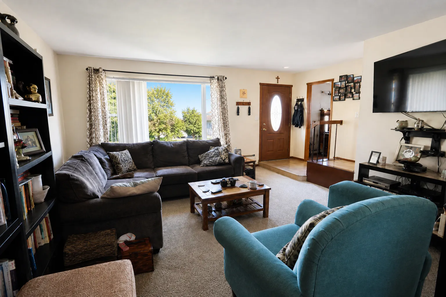 Same living room after HDR editing with balanced exposure and natural color
