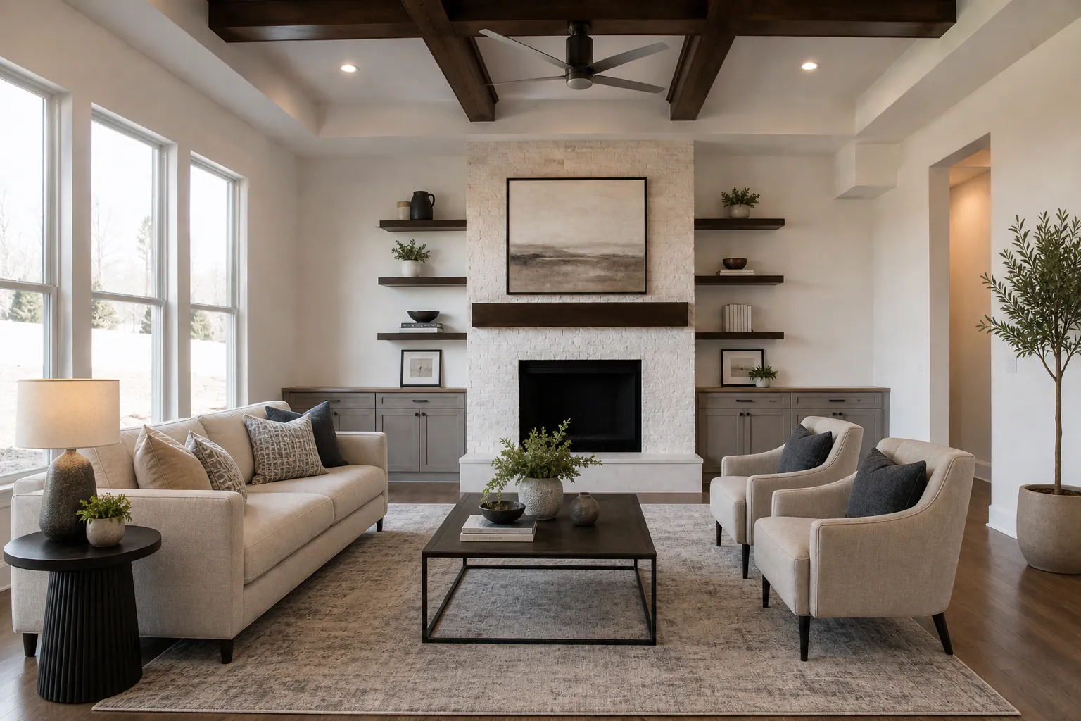 Same room virtually staged with a sofa, rug, art and decor